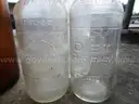 (18) USED GLASS BOTTLES; (1) USED PULL-TAB CAN