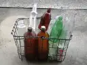 (18) USED GLASS BOTTLES; (1) USED PULL-TAB CAN