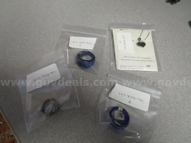 (3) USED RINGS AND (1) UNUSED NECKLACE