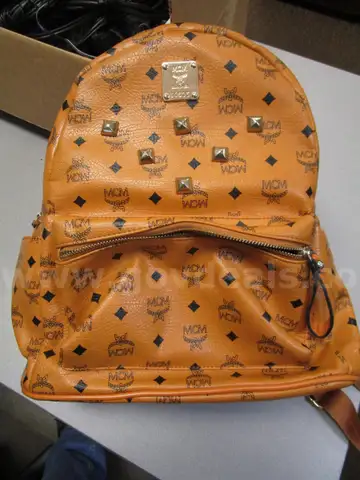 (1) USED BROWN/BLACK MCM MUNCHEN BACKPACK