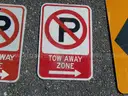 USED (6) TOW AWAY ZONE SIGNS, (3) CAUTION SIGNS, (1) ALL WAY SIGN