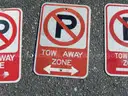 USED (6) TOW AWAY ZONE SIGNS, (3) CAUTION SIGNS, (1) ALL WAY SIGN