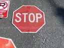 USED (3) TOW AWAY SIGNS, (4) STOP SIGNS, (1) SPEED HUMP SIGN, (1) STREET SIGN, (1) CAUTION SIGN