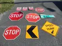 USED (3) TOW AWAY SIGNS, (4) STOP SIGNS, (1) SPEED HUMP SIGN, (1) STREET SIGN, (1) CAUTION SIGN