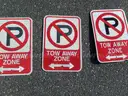 USED (3) TOW AWAY SIGNS, (4) STOP SIGNS, (1) SPEED HUMP SIGN, (1) STREET SIGN, (1) CAUTION SIGN