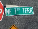 USED (3) TOW AWAY SIGNS, (4) STOP SIGNS, (1) SPEED HUMP SIGN, (1) STREET SIGN, (1) CAUTION SIGN