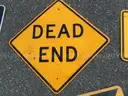 USED (1) DEAD END SIGN, (2) CAUTION SIGNS, (4) ARROW SIGNS, (1) TRAIL X-ING SIGN, (1) RIGHT LANE BIKE ONLY SIGN