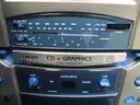 (1) USED CONCOURSE SUITCASE WITH THE SINGING MACHINE KARAOKE, STVG-700 &#x26; A MICROPHONE INSIDE