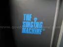 (1) USED CONCOURSE SUITCASE WITH THE SINGING MACHINE KARAOKE, STVG-700 &#x26; A MICROPHONE INSIDE