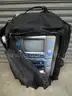 (1) USED CONCOURSE SUITCASE WITH THE SINGING MACHINE KARAOKE, STVG-700 &#x26; A MICROPHONE INSIDE