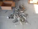 USED (1) BOX OF ASSORTED BUS HARDWARE AND PARTS