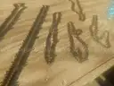 USED (11) CHAINSAW CHAINS RANGING FROM 26&#x22; TO 15&#x22; L