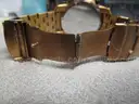 (1) USED TOMMY BAHAMA BRONZE GOLD COLOR WATCH