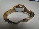 (1) USED TOMMY BAHAMA BRONZE GOLD COLOR WATCH