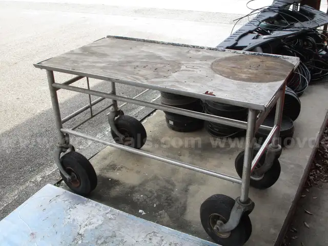 (1) USED ROLLING WORK-TABLE