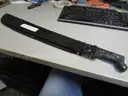 (1) USED 18&#x22; BLADE MATCHETE IN A BLACK SHEATH; (2) USED FOLDING KNIVES; (1) USED HATCHET
