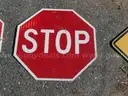 USED (6) STREET SIGNS, (2) STOP SIGNS, (1) DEAD END SIGN, (1) TOW AWAY ZONE SIGN