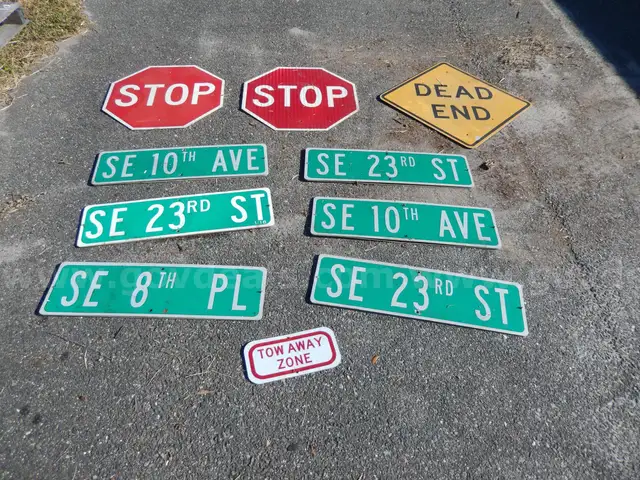 USED (6) STREET SIGNS, (2) STOP SIGNS, (1) DEAD END SIGN, (1) TOW AWAY ZONE SIGN