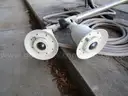 (8) USED METAL POLES; (4) HAVE CAMERAS ATTACHED