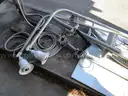 (8) USED METAL POLES; (4) HAVE CAMERAS ATTACHED
