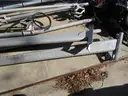 (8) USED METAL POLES; (4) HAVE CAMERAS ATTACHED