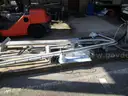 (8) USED METAL POLES; (4) HAVE CAMERAS ATTACHED
