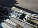 (8) USED METAL POLES; (4) HAVE CAMERAS ATTACHED