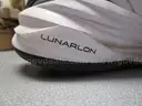 (1) PAIR OF USED NIKE LUNARLON WHITE/BLACK TENNIS SHOE, SIZE 10