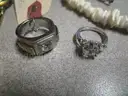 BAG OF VARIOUS USED COSTUME JEWELRY