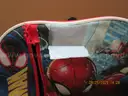 (1) USED SPIDERMAN BACKPACK W/MAGNETIC CHANGING PAD, SWIM GOGGLES & HAIR CLIPS.