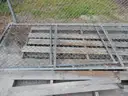 USED (6) BUNDLES OF CHAIN LINK OR CATTLE FENCING, (2) CHAIN LINK FENCING POSTS, (1) BOX OF ASSORTED FENCING HARDWARE