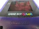 (1) USED PURPLE GAMEBOY COLOR, FOR PARTS OR REPAIR