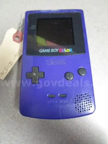 (1) USED PURPLE GAMEBOY COLOR, FOR PARTS OR REPAIR
