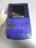 (1) USED PURPLE GAMEBOY COLOR, FOR PARTS OR REPAIR