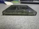 (1) USED PURPLE GAMEBOY COLOR, FOR PARTS OR REPAIR
