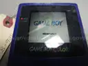 (1) USED PURPLE GAMEBOY COLOR, FOR PARTS OR REPAIR