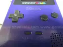 (1) USED PURPLE GAMEBOY COLOR, FOR PARTS OR REPAIR