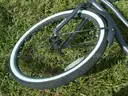 USED (1) WHITE BIKE, (1) RALEIGH PASSAGE BIKE, (1) RALEIGH PASSAGE BIKE, (1) RALEIGH PASSAGE BIKE