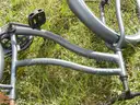 USED (1) WHITE BIKE, (1) RALEIGH PASSAGE BIKE, (1) RALEIGH PASSAGE BIKE, (1) RALEIGH PASSAGE BIKE