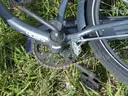 USED (1) WHITE BIKE, (1) RALEIGH PASSAGE BIKE, (1) RALEIGH PASSAGE BIKE, (1) RALEIGH PASSAGE BIKE
