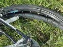 USED (1) WHITE BIKE, (1) RALEIGH PASSAGE BIKE, (1) RALEIGH PASSAGE BIKE, (1) RALEIGH PASSAGE BIKE