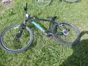 USED (1) WHITE BIKE, (1) RALEIGH PASSAGE BIKE, (1) RALEIGH PASSAGE BIKE, (1) RALEIGH PASSAGE BIKE
