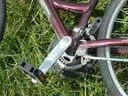 USED (1) WHITE BIKE, (1) RALEIGH PASSAGE BIKE, (1) RALEIGH PASSAGE BIKE, (1) RALEIGH PASSAGE BIKE