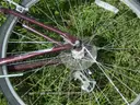USED (1) WHITE BIKE, (1) RALEIGH PASSAGE BIKE, (1) RALEIGH PASSAGE BIKE, (1) RALEIGH PASSAGE BIKE