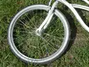 USED (1) WHITE BIKE, (1) RALEIGH PASSAGE BIKE, (1) RALEIGH PASSAGE BIKE, (1) RALEIGH PASSAGE BIKE