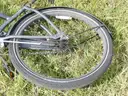USED (1) WHITE BIKE, (1) RALEIGH PASSAGE BIKE, (1) RALEIGH PASSAGE BIKE, (1) RALEIGH PASSAGE BIKE