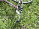 USED (1) WHITE BIKE, (1) RALEIGH PASSAGE BIKE, (1) RALEIGH PASSAGE BIKE, (1) RALEIGH PASSAGE BIKE