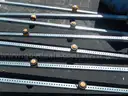 USED (7) SOLAR POWERED LIGHTS ON GALVANIZED SQUARE POSTS, (3) SOLAR POWERED LIGHTS