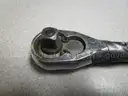 (1) USED SOCKET WRENCH; (1) SET OF SOCKET ATTACHMENTS