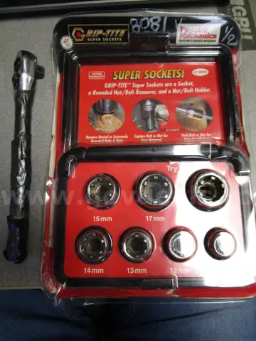 (1) USED SOCKET WRENCH; (1) SET OF SOCKET ATTACHMENTS